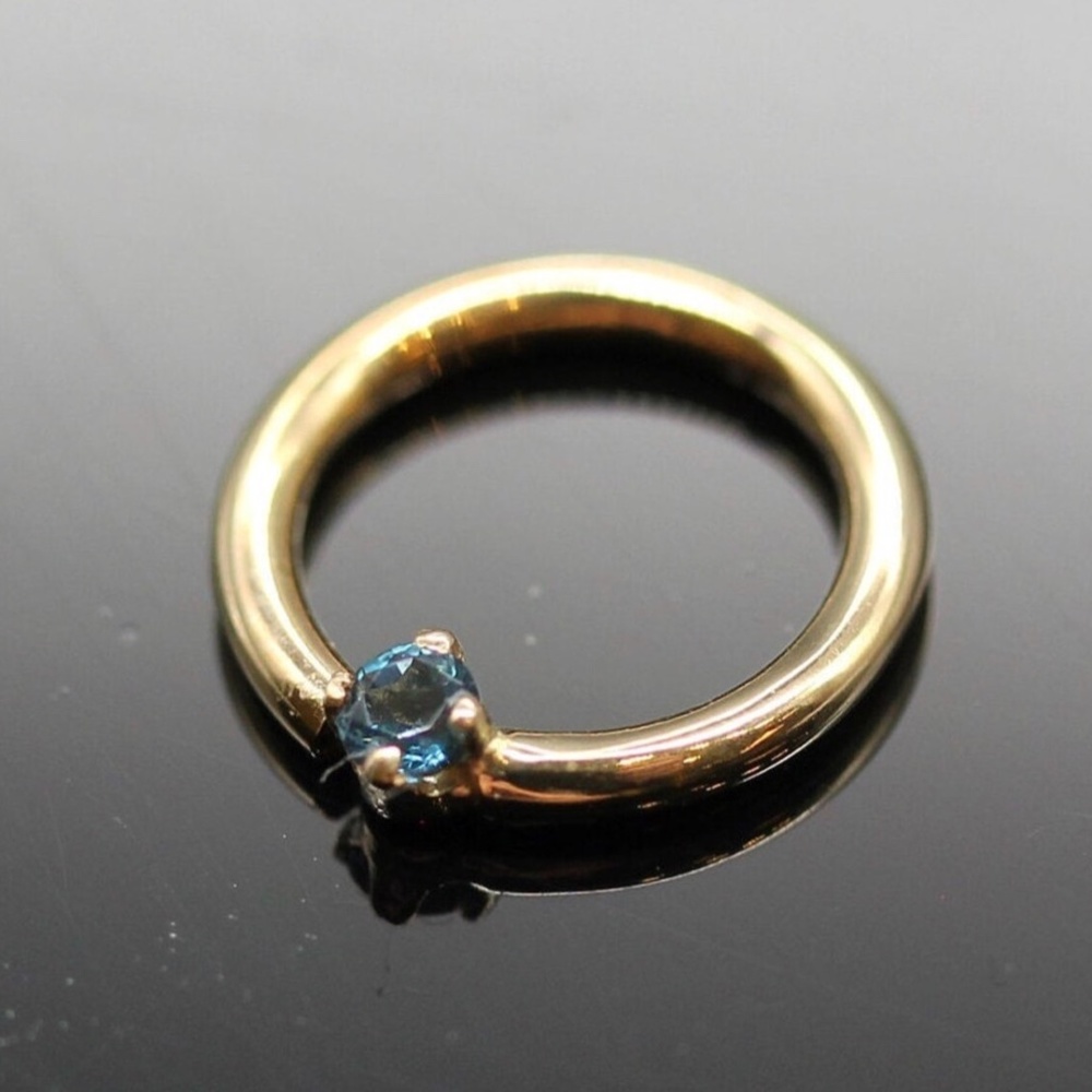 Brand New Unused 14k Yellow Gold Seam Ring with 1.7mm Blue Topaz, 7/16",16g